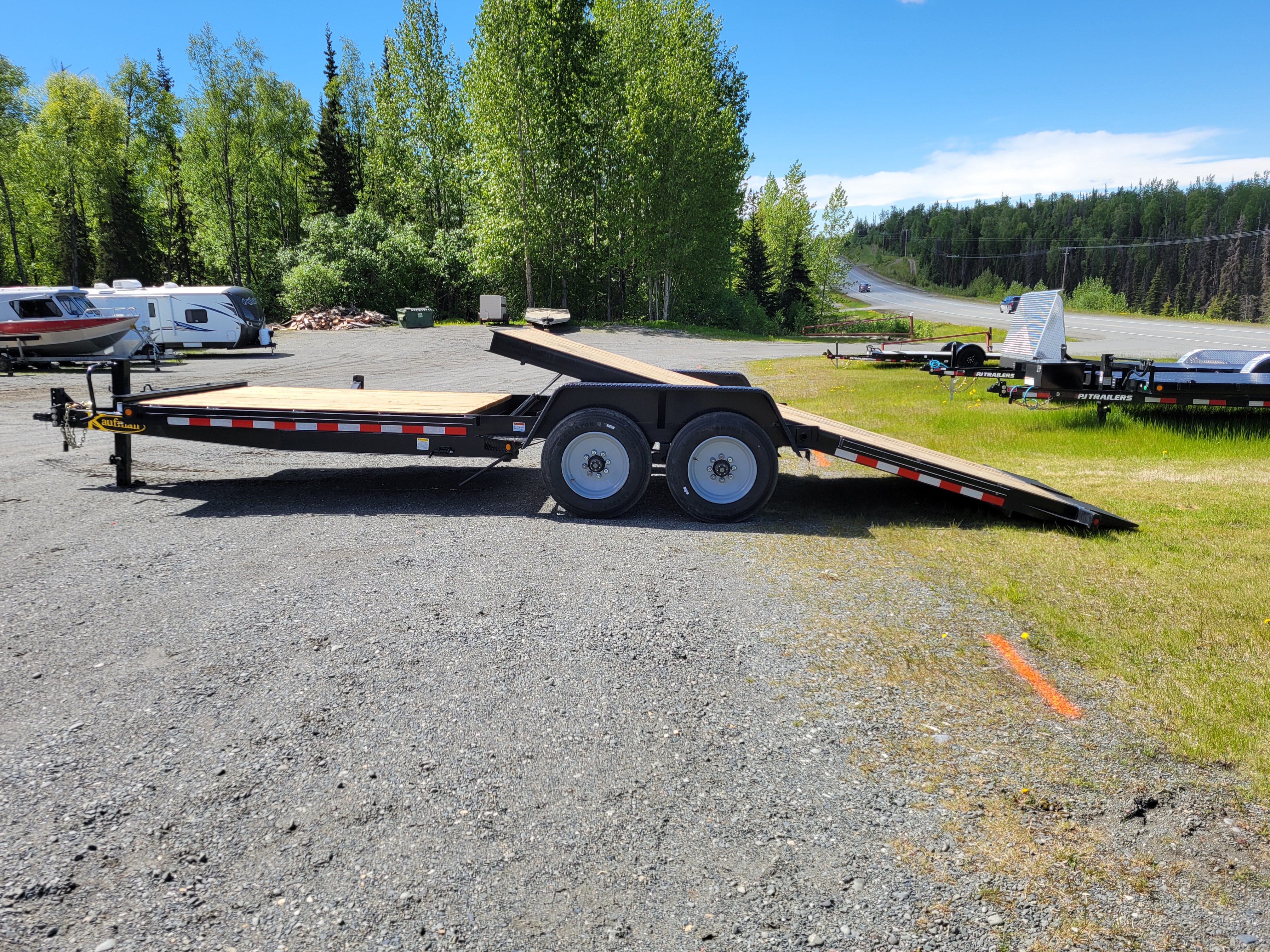 New 2025 Kaufman Trailers Deluxe Equipment Tilt Trailer